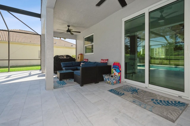 view of patio / terrace with ceiling fan and an outdoor living space