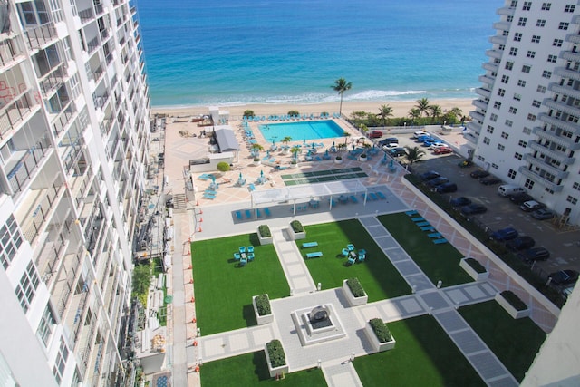 bird's eye view with a view of the beach and a water view