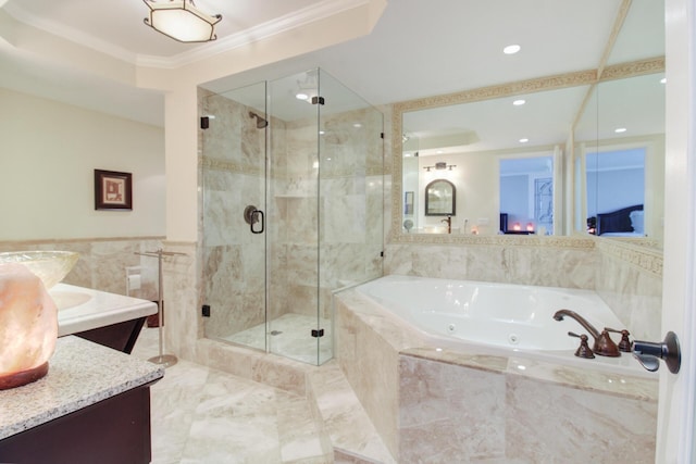 bathroom with vanity, tile walls, and independent shower and bath