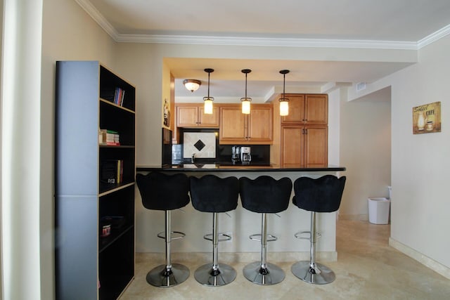 kitchen featuring kitchen peninsula, decorative backsplash, crown molding, pendant lighting, and a breakfast bar area