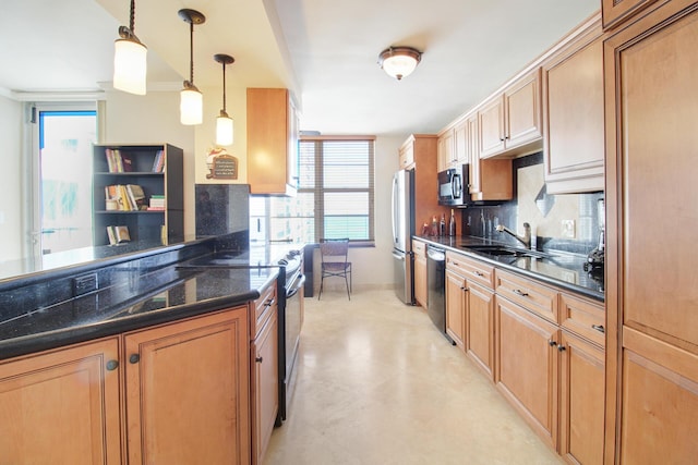 kitchen with pendant lighting, backsplash, dark stone counters, sink, and stainless steel appliances