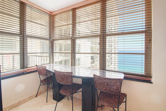 dining area featuring light tile patterned floors