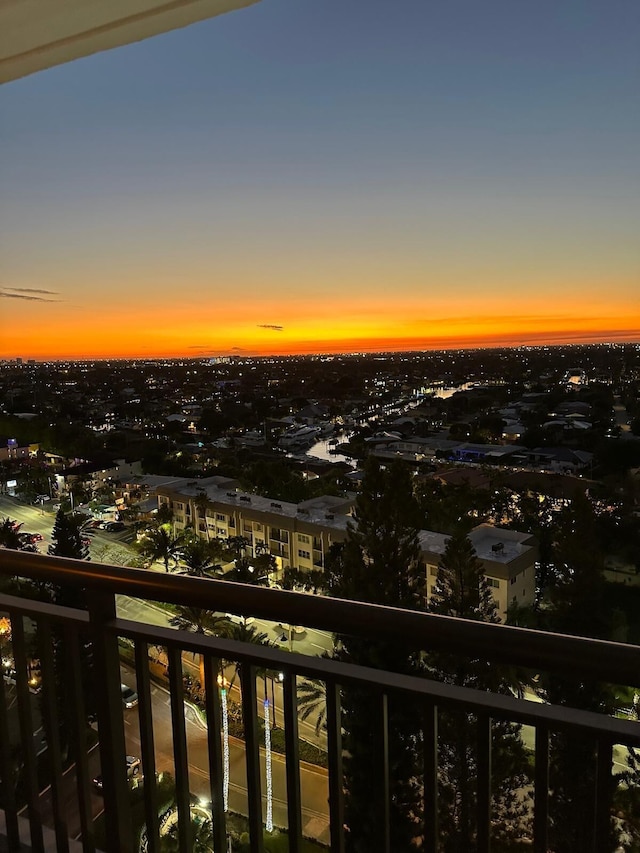 view of balcony at dusk