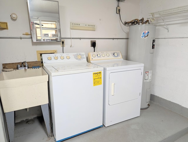 washroom with washer and dryer and electric water heater