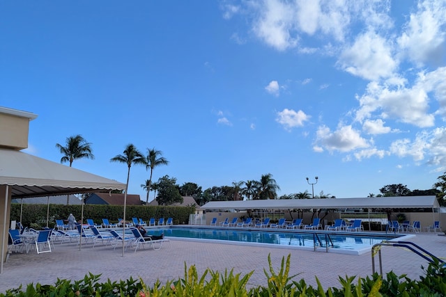 view of swimming pool with a patio area