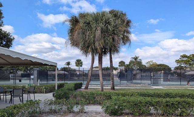 exterior space featuring tennis court