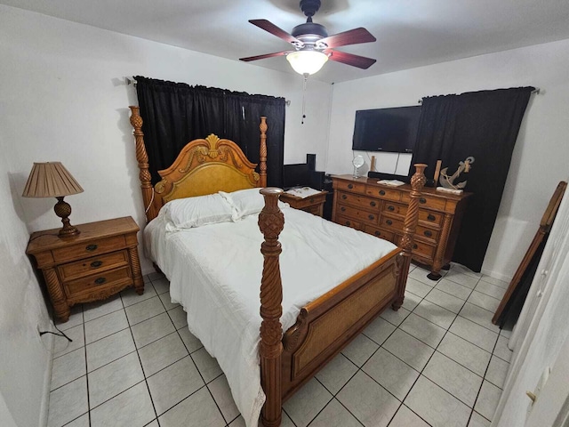 bedroom featuring ceiling fan and light tile patterned flooring