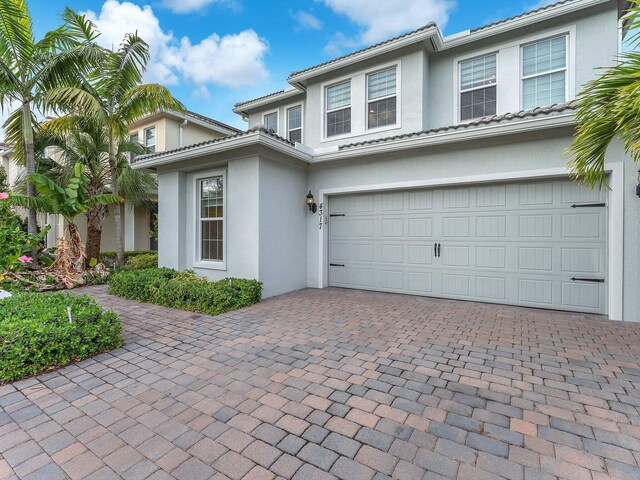 view of front of property featuring a garage