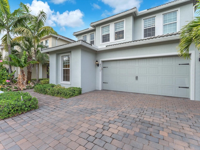 view of front of property with a garage