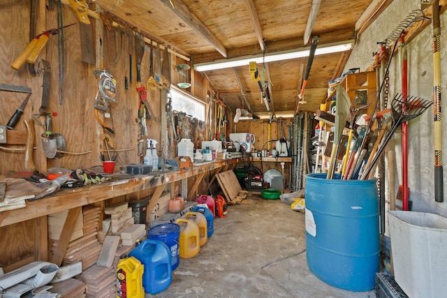 interior space with a workshop area and concrete flooring