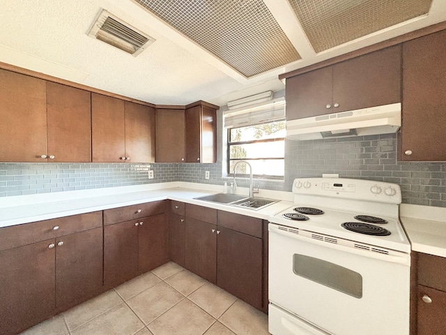 kitchen featuring sink, white electric stove, light tile patterned floors, tasteful backsplash, and dark brown cabinetry