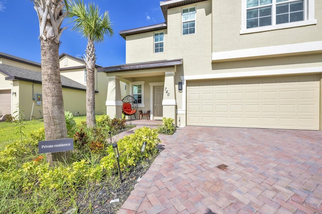 view of front of house with a garage