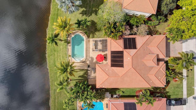 birds eye view of property featuring a water view