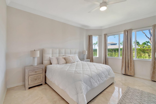 bedroom with ceiling fan and crown molding