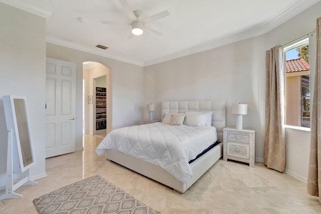 bedroom with ceiling fan and ornamental molding