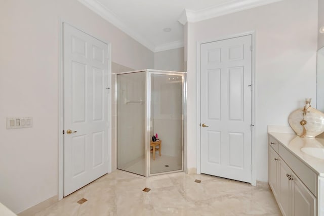 bathroom with vanity, walk in shower, and ornamental molding