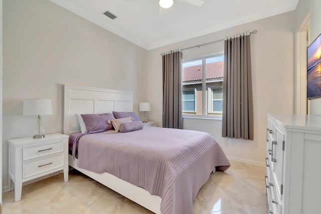 bedroom with ceiling fan and ornamental molding