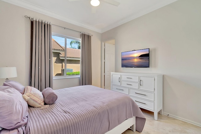 bedroom with ceiling fan and crown molding