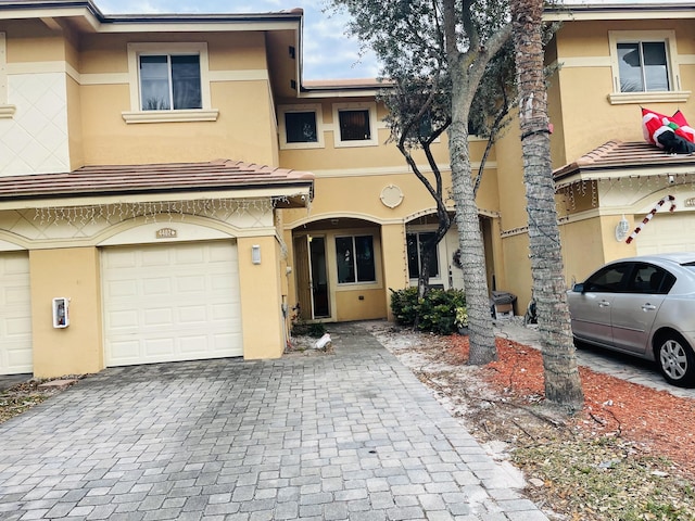 view of front of property featuring a garage