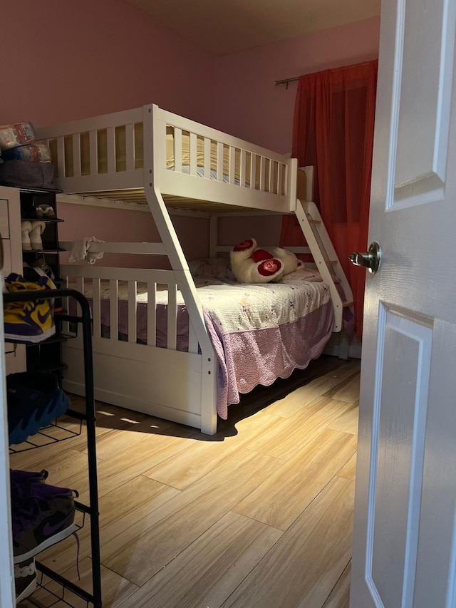 bedroom with light hardwood / wood-style floors