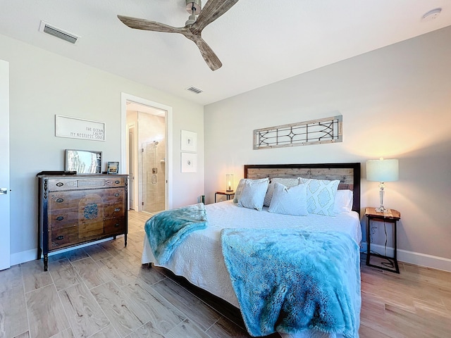 bedroom featuring ensuite bath, ceiling fan, and light hardwood / wood-style flooring