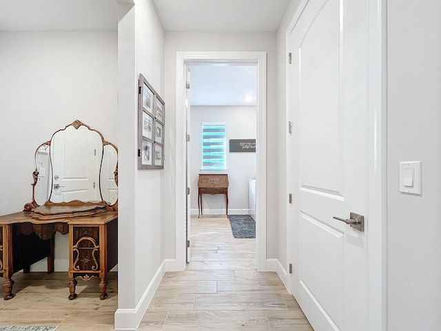 hallway featuring light hardwood / wood-style flooring