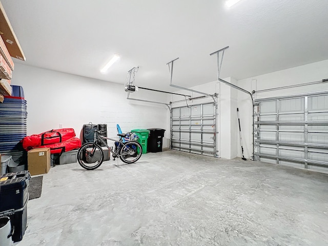 garage featuring a garage door opener