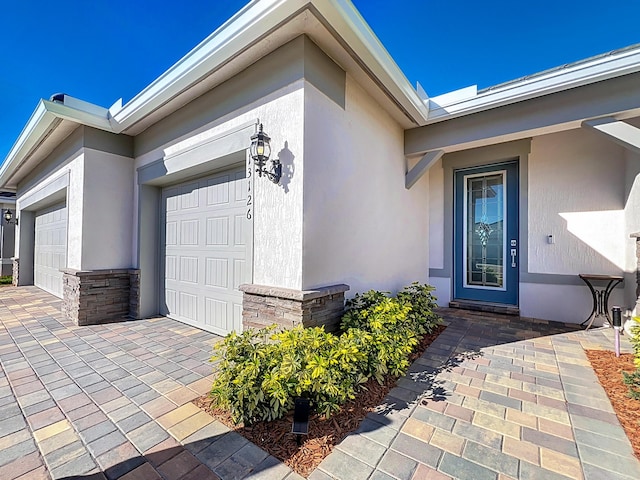 entrance to property with a garage