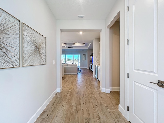 hall featuring light hardwood / wood-style flooring