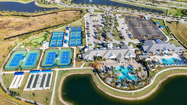 birds eye view of property with a water view