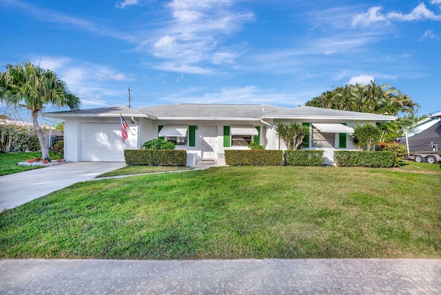 ranch-style home featuring a garage, central air condition unit, and a front yard