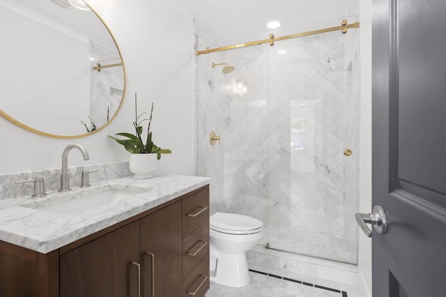 bathroom featuring ornamental molding, toilet, walk in shower, and vanity