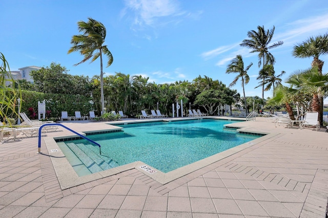 view of swimming pool featuring a patio area