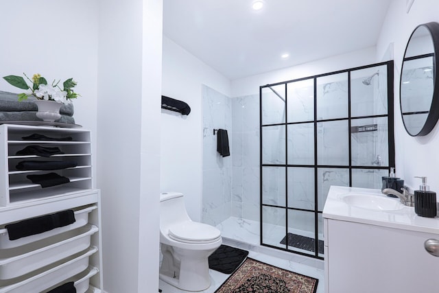 bathroom with an enclosed shower, vanity, and toilet