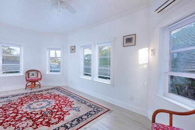 sitting room featuring ceiling fan, a wall mounted air conditioner, crown molding, wood ceiling, and light wood-type flooring