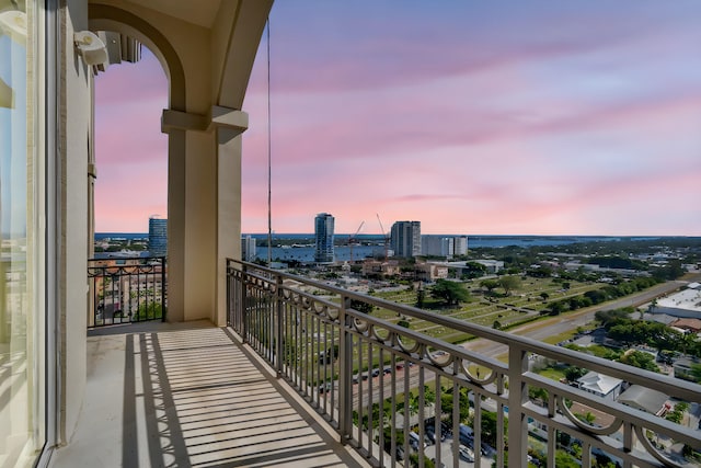 view of balcony at dusk