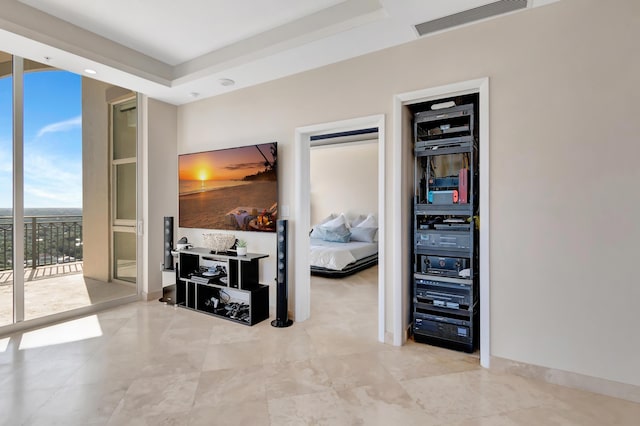 corridor with a tray ceiling