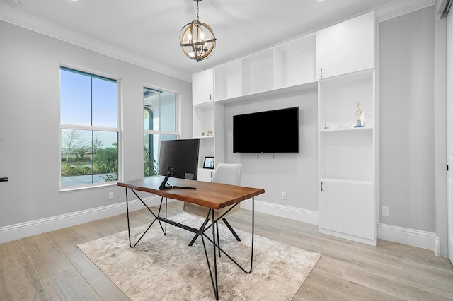 home office featuring ornamental molding, a chandelier, and light wood-type flooring