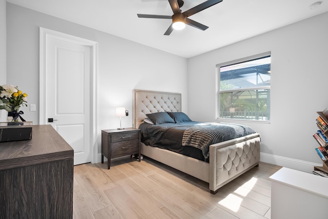 bedroom featuring ceiling fan and light wood-type flooring