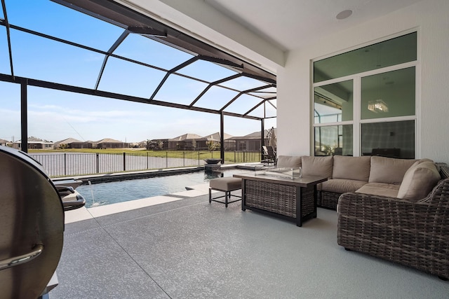 view of patio with a fenced in pool, a lanai, an outdoor living space, and pool water feature