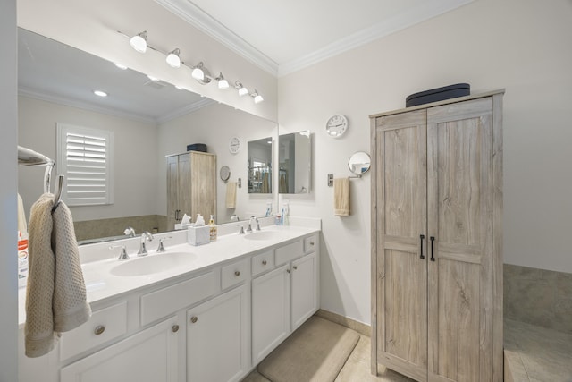 bathroom featuring vanity, tile patterned floors, and ornamental molding