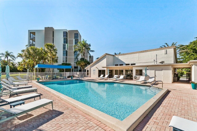 view of swimming pool with a patio