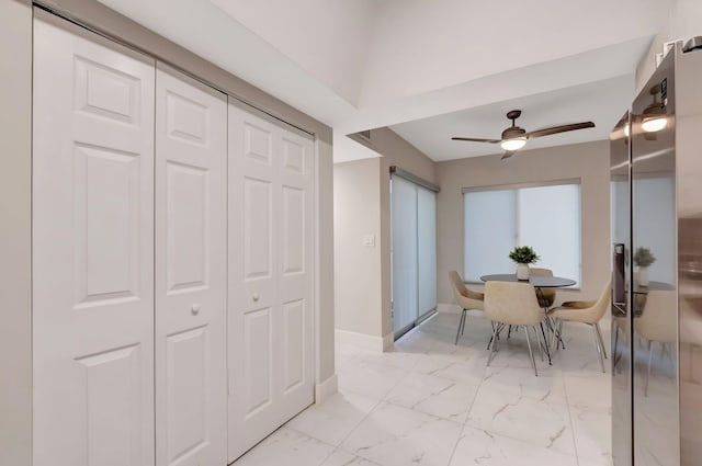 dining space featuring ceiling fan