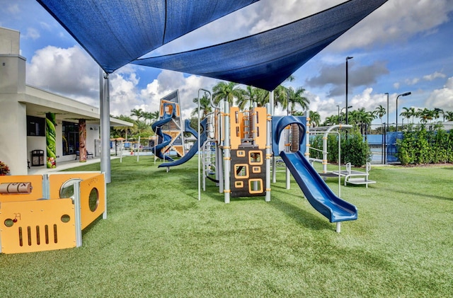 view of jungle gym with a yard