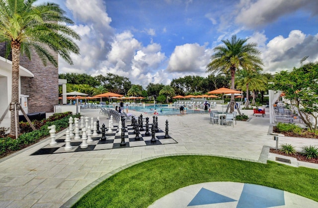 view of swimming pool featuring a patio