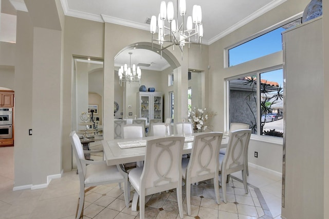 tiled dining space featuring an inviting chandelier and crown molding