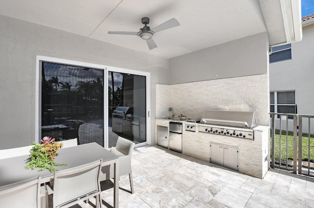 view of patio / terrace with an outdoor kitchen, sink, grilling area, and ceiling fan