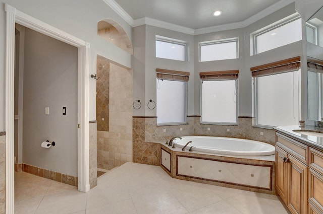 bathroom featuring tile patterned flooring, tile walls, separate shower and tub, vanity, and crown molding