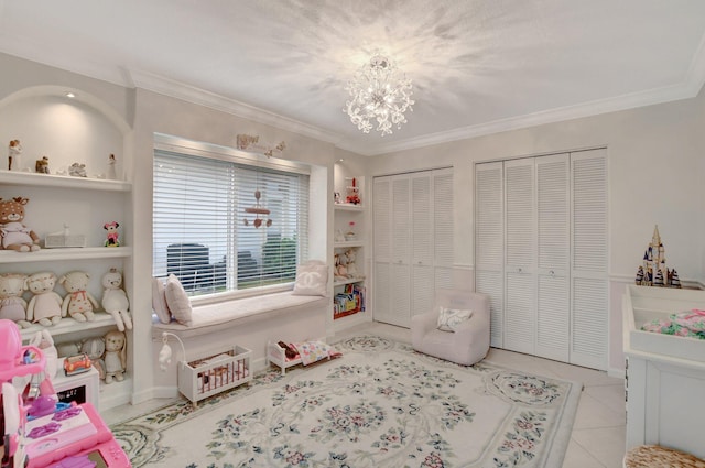 tiled bedroom with two closets, crown molding, and a chandelier