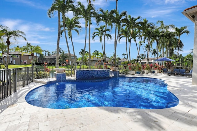 view of pool featuring a patio and pool water feature